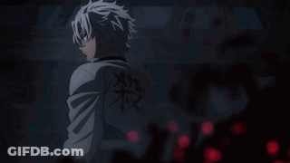 A Man In A White Jacket With Chinese Writing On The Back Is Standing In The Dark . GIF