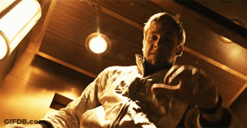 A Man In A White Jacket With The Word Adidas On The Front GIF