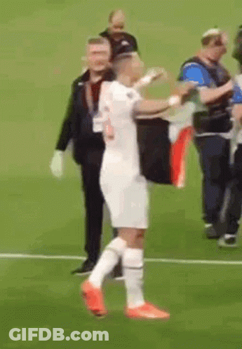 A Man In A White Jersey With The Number 5 On It GIF