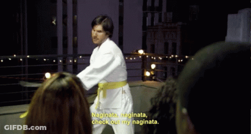 A Man In A White Karate Uniform With A Yellow Belt Says " Naginata Naginata Check Out My Naginata " GIF