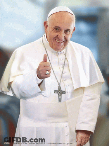 A Man In A White Robe Is Giving A Thumbs Up Sign GIF