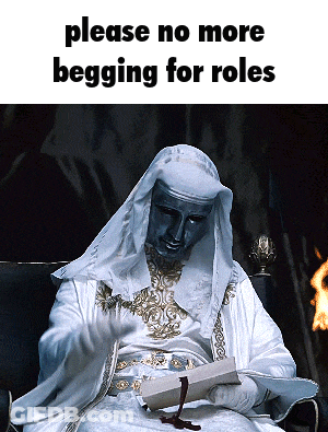 A Man In A White Robe Is Reading A Book With The Words " Please No More Begging For Roles " Above Him GIF
