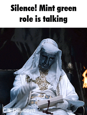 A Man In A White Robe Is Reading A Book With The Words " Silence Mint Green Role Is Talking " Below Him GIF