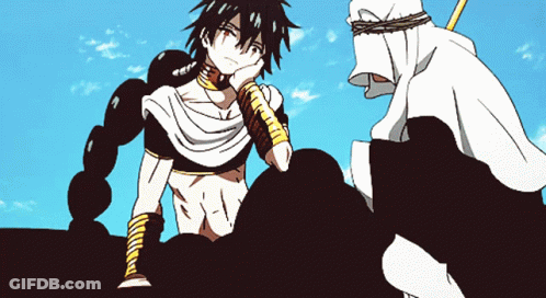 A Man In A White Robe Sits Next To Another Man In A White Robe GIF