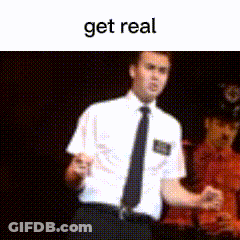 A Man In A White Shirt And Black Tie Is Standing In Front Of A Black Background With The Words Get Real On The Bottom GIF