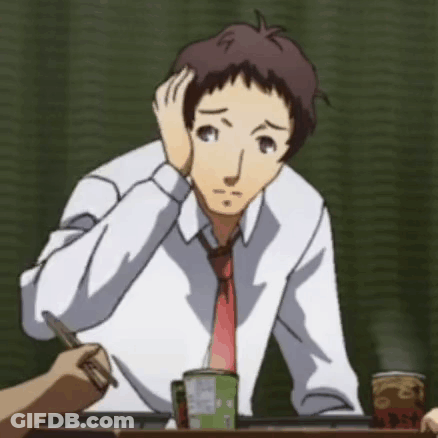 A Man In A White Shirt And Red Tie Sitting At A Table GIF