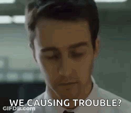 A Man In A White Shirt And Tie Is Asking If He Is Causing Trouble GIF