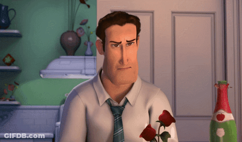 A Man In A White Shirt And Tie Is Holding Two Red Roses GIF