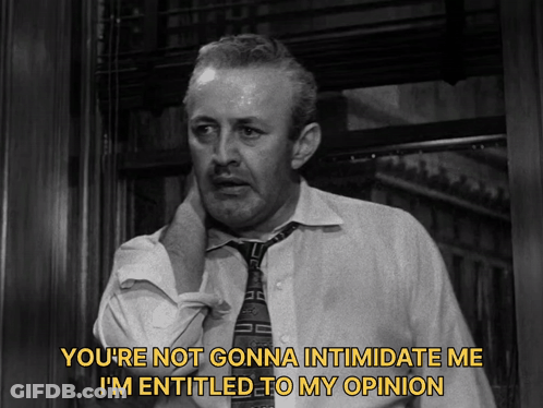 A Man In A White Shirt And Tie Is Saying You 'Re Not Gonna Intimidate Me I 'M Entitled To My Opinion GIF