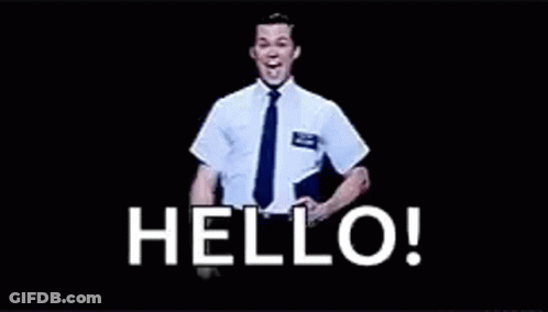 A Man In A White Shirt And Tie Is Standing In Front Of A Black Background With The Words `` Hello '' Written On It . GIF