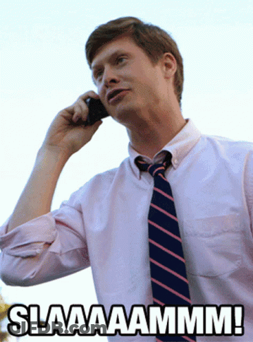 A Man In A White Shirt And Tie Is Talking On A Cell Phone With The Caption Slaaaaammm GIF