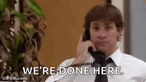 A Man In A White Shirt And Tie Is Talking On A Phone And Saying `` We 'Re Done Here '' . GIF