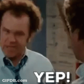 A Man In A White Shirt And Tie Is Talking To Another Man In A Room . GIF