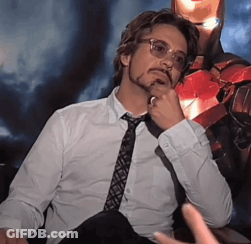 A Man In A White Shirt And Tie Is Thinking GIF