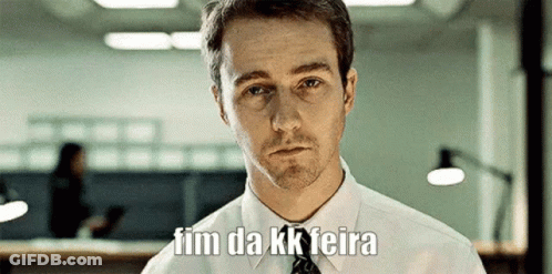 A Man In A White Shirt And Tie Says " Fim Da Kk Feira " In A Foreign Language GIF