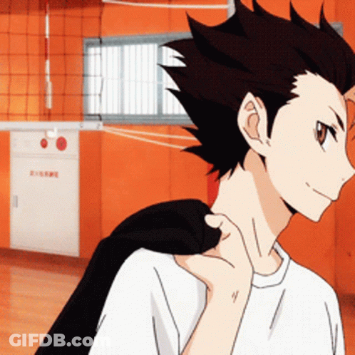 A Man In A White Shirt Has A Black Jacket On His Shoulder GIF