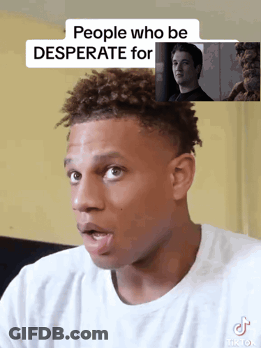 A Man In A White Shirt Has A Tiktok Sticker On His Shirt GIF