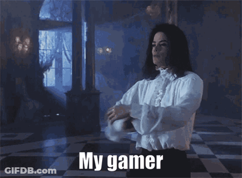 A Man In A White Shirt Has His Arms Outstretched And Says " My Gamer " On The Bottom GIF
