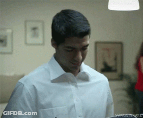 A Man In A White Shirt Has Swagginkavz Written On The Bottom Right GIF