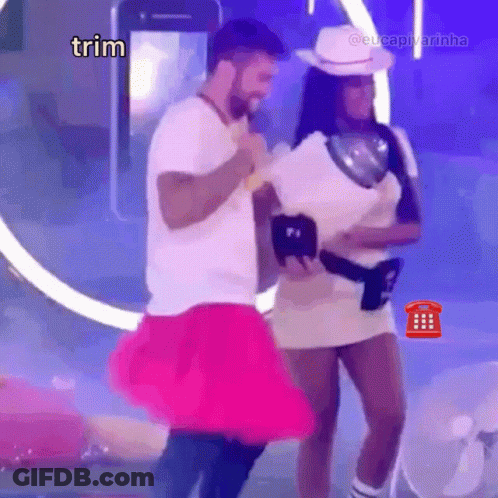A Man In A White Shirt Is Dancing With A Woman In A Pink Skirt And The Word Trim Is On The Bottom GIF