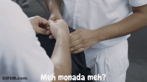 A Man In A White Shirt Is Holding Another Man 'S Hand And The Words " Meh Monada Meh " Are Above Him GIF