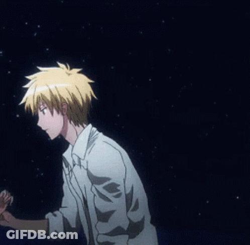 A Man In A White Shirt Is Holding Another Man 'S Hand In Front Of A Starry Night Sky . GIF