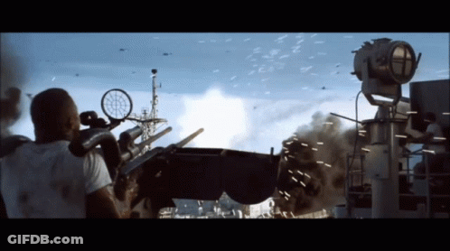 A Man In A White Shirt Is Looking Through A Sniper Scope At A Military Explosion GIF