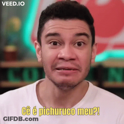 A Man In A White Shirt Is Making A Funny Face And Saying " Ce E Pichuruco Meu " GIF