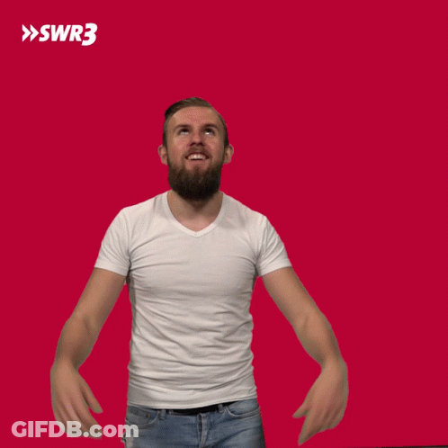 A Man In A White Shirt Is Raising His Hands In The Air With A Swr3 Logo In The Background GIF