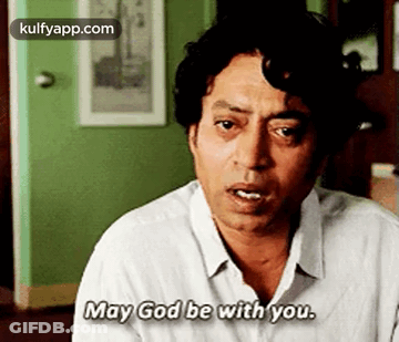 A Man In A White Shirt Is Saying `` May God Be With You . '' GIF