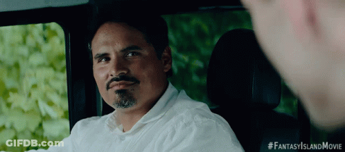 A Man In A White Shirt Is Sitting In The Back Seat Of A Car With #Fantasyislandmovie Written On The Bottom Right GIF