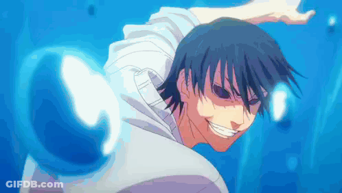 A Man In A White Shirt Is Smiling While Holding A Blue Ball In His Hand . GIF