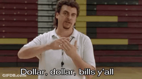 A Man In A White Shirt Is Standing In Front Of A Basketball Court And Making A Gesture . GIF