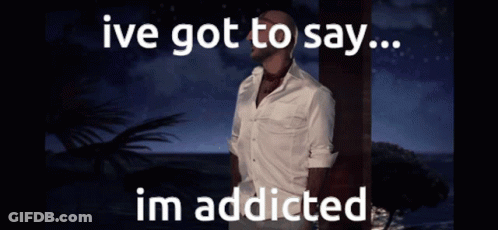 A Man In A White Shirt Is Standing In Front Of The Ocean With The Words Ive Got To Say Im Addicted GIF