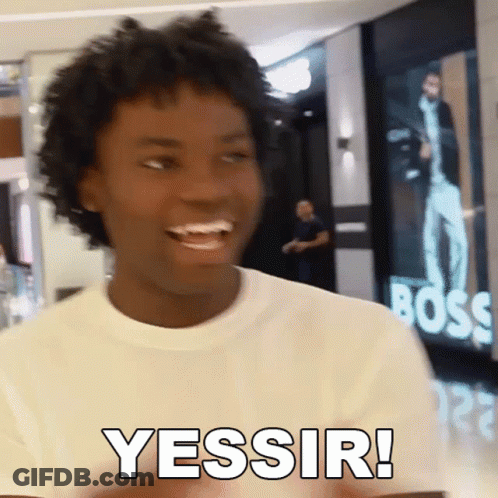 A Man In A White Shirt Says Yessir In Front Of A Boss Sign GIF