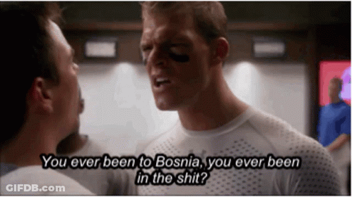A Man In A White Shirt Says " You Ever Been To Bosnia You Ever Been In The Shit " While Another Man Looks On GIF
