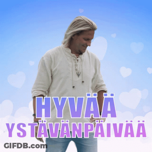 A Man In A White Shirt Stands In Front Of A Blue Background With Hearts And The Words Hyväa Ystävänpäiväa GIF