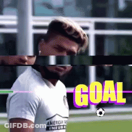 A Man In A White Shirt Stands In Front Of A Goal Sign GIF