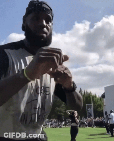 A Man In A White Shirt That Says More Than An Athlete GIF