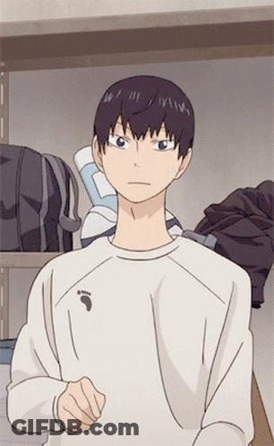 A Man In A White Shirt With A Bird On The Front GIF