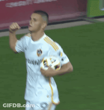 A Man In A White Shirt With Herbalife On It GIF