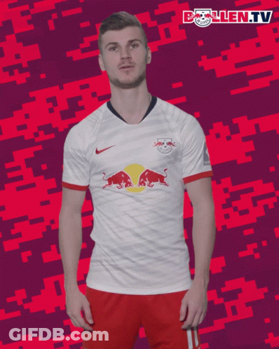 A Man In A White Shirt With Red Bulls On It GIF