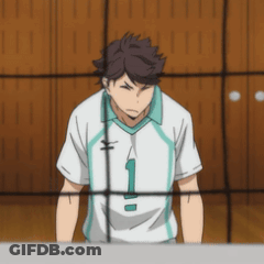 A Man In A White Shirt With The Number 1 On The Front GIF