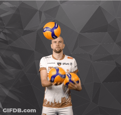 A Man In A White Shirt With The Number 17 Juggling Two Balls GIF