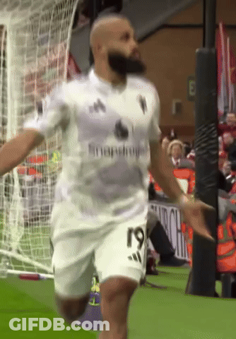 A Man In A White Shirt With The Number 19 On It GIF