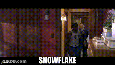 A Man In A White Shirt With The Number 3 On It Is Dancing In A Room With The Words Snowflake Above Him GIF