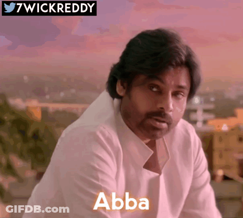 A Man In A White Shirt With The Word Abba On The Front GIF