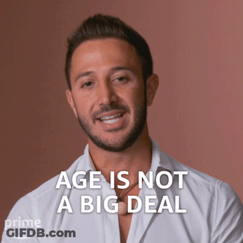 Man In White Shirt Saying Age Is Not A Big Deal GIF