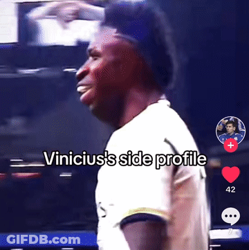 A Man In A White Shirt With The Words " Vinicius 'S Side Profile " Above Him GIF