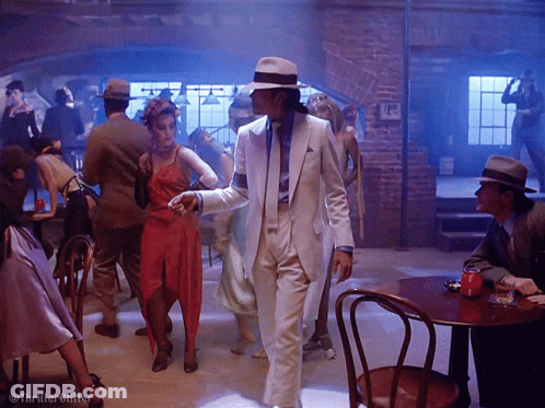 White Suit Man Dancing With People GIF
